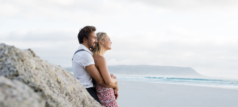Couple looking at sea