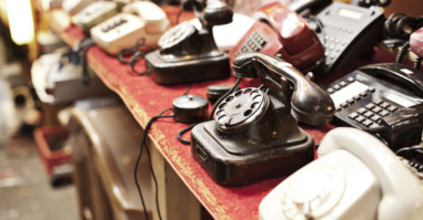 Old telephones in a row
