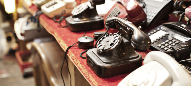 Old telephones in a row