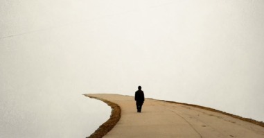 Man walking along a footpath