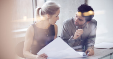 Man and woman in office having a meeting