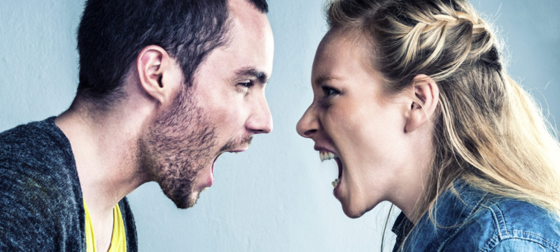 Young couple is in the middle of a big discussion