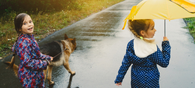 Girls walking with dog