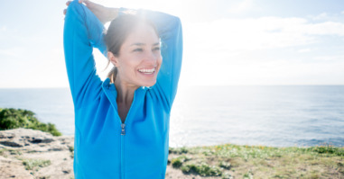 Happy woman stretching