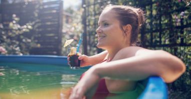 Woman relaxing in pool.