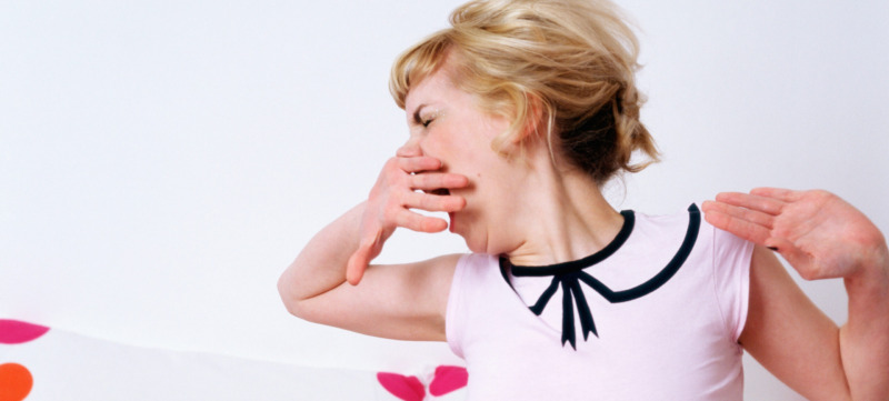Woman yawning