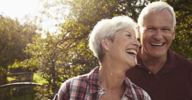 Senior couple in front of lake