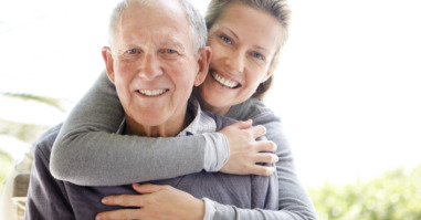 Beautiful young woman embracing her father