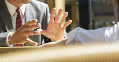 Business mans hands making a gesture
