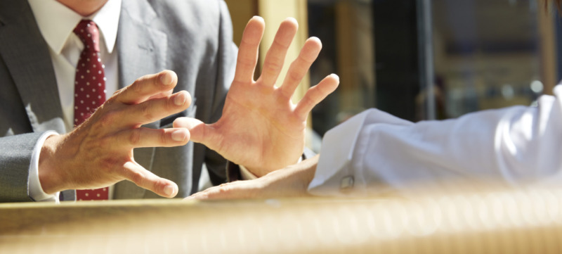 Business mans hands making a gesture
