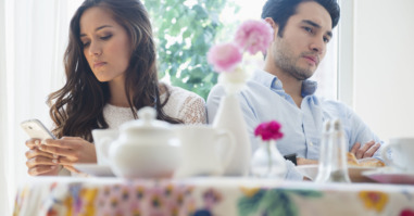 Couple arguing in restaurant