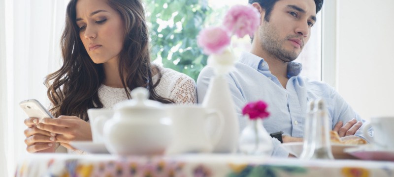 Couple arguing in restaurant