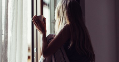 Woman Having Breakfast At Home, Granada, Spain.