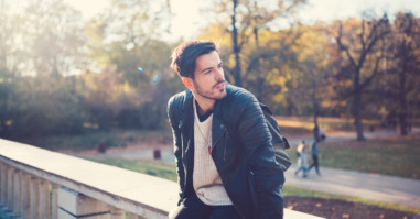 Man in the park looking over the shoulder