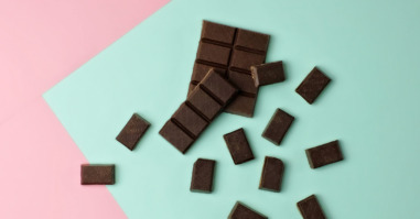 Chocolate pieces on color block background