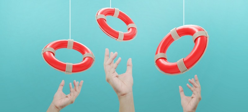 Lifebuoy in hand and Support to survive Concept. hands of a businessman who receives on Blue background. copy space, digital, banner – 3d rendering