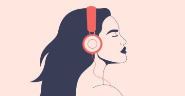 Confident woman listens to music with headphones. Girl with flying hair in earphones enjoying the sound.