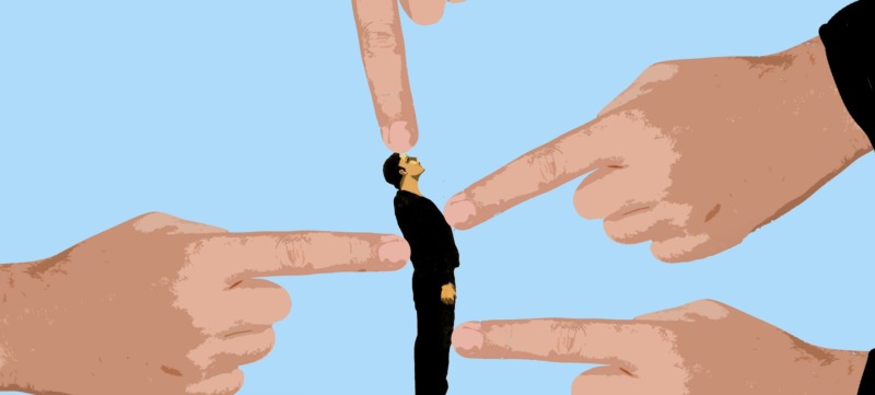 Illustratie van handen die wijzen naar een persoon.