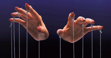 afbeelding van een poppenspeler