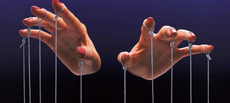 afbeelding van een poppenspeler