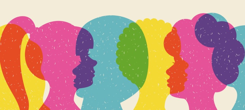 illustratie van verschillende gezichten die elkaar beinvloeden als een symbool voor manipulatief gedrag